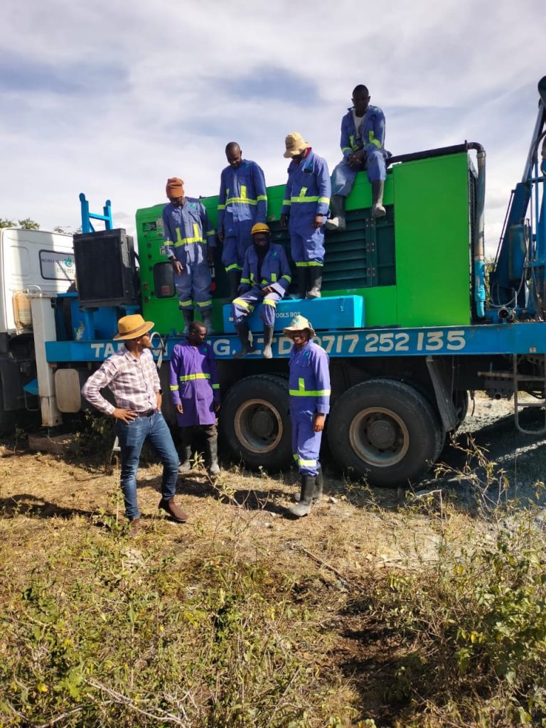AquaEco Water Solutions drilling rig and team